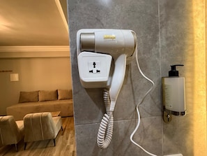 Shower, free toiletries, towels, toilet paper