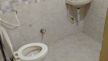 Shower, rainfall showerhead, towels, soap