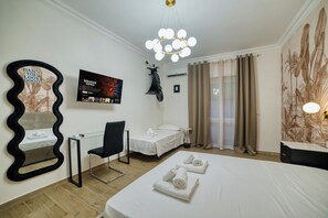 Deluxe Triple Room | Desk, free WiFi