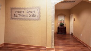 A hallway with a sign reading "Zermatt Resort Spa & Wellness Center". - Swiss-charmed Mountain Retreat NEW Listing (Midway)