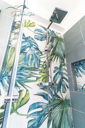 Shower, rainfall showerhead, bidet, towels