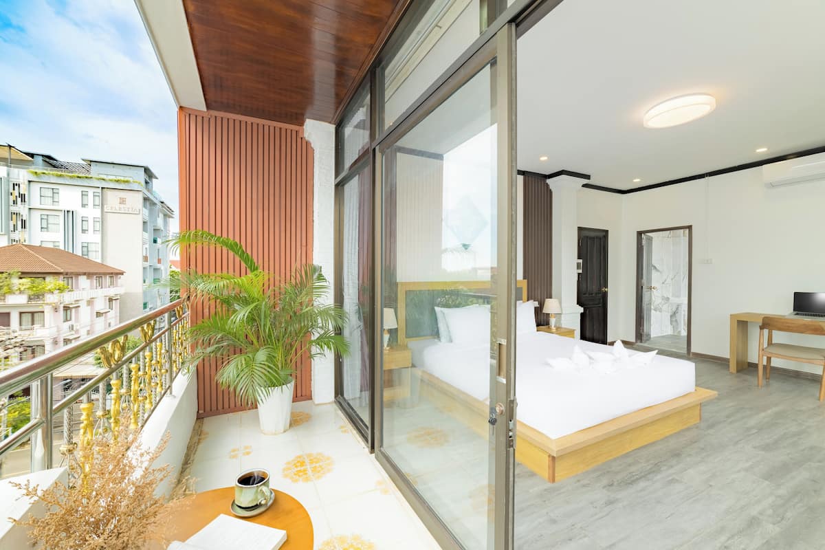 Deluxe Double Room, Balcony, City View | Desk, laptop workspace, blackout drapes, iron/ironing board
