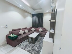 Departamento Deluxe | Área de sala de estar