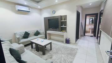 Departamento Deluxe | Área de sala de estar