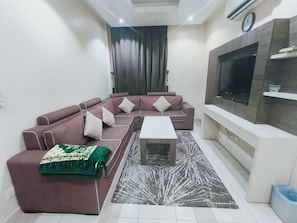 Deluxe Apartment | Living area - VIP For Apartment (Riyadh)