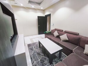 Departamento Deluxe | Área de sala de estar