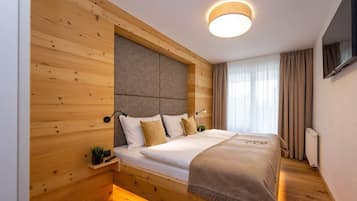 2 chambres, coffres-forts dans les chambres, fer et planche Ă repasser