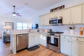 House, Multiple Beds, Patio, Garden View (Calypso Cottage) | Private kitchen | Fridge, microwave, oven, stovetop