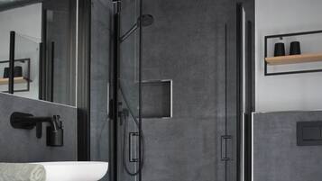 Chuveiro, secador de cabelo, toalhas de banho, sabonete