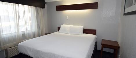 Habitación estándar, 1 cama King size | Escritorio, espacio para trabajar con laptop y wifi gratis