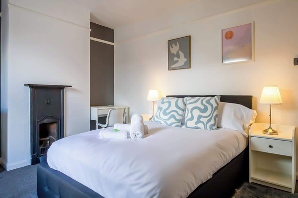 “Second bedroom — features a workspace and plenty of room to relax and recharge.”