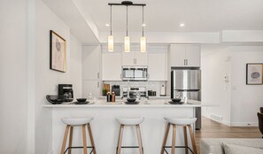 Fridge, microwave, oven, stovetop - Executive Suite with King Bed » Garage » AC » 65` (Calgary)