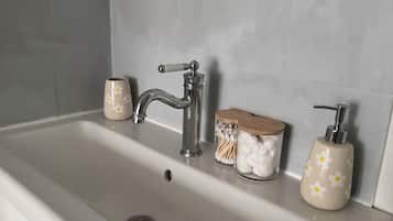 Hair dryer, towels, soap, toilet paper