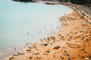 On the beach, beach towels