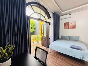Studio, Balcony, Courtyard View | Desk, blackout drapes, iron/ironing board, free WiFi