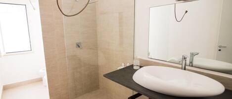 Shower, bidet, towels, soap