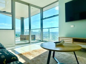 TV - KMG Apartments at The Apex - Two-Bedroom Superior Corner Apartment (Johannesburg)