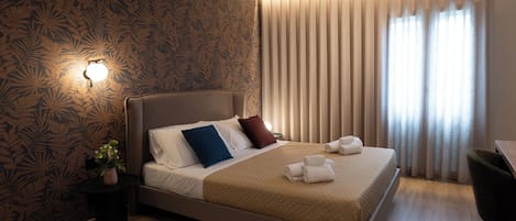 Habitación triple de lujo, 1 habitación | Insonorización, tabla de planchar con plancha y wifi gratis