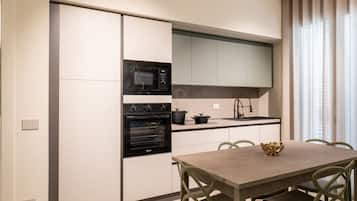 Departamento Deluxe, balcón | Cocina privada