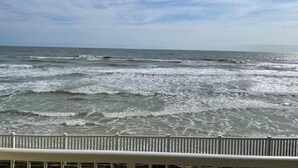 A view of the ocean with waves from a balcony. - Ocean View Third Floor 2/2 (New Smyrna Beach)