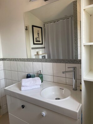 Hair dryer, towels, soap, toilet paper