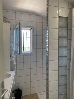 Hair dryer, towels, soap, toilet paper