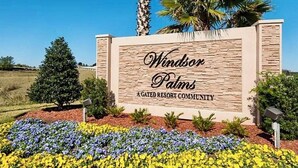 A sign for Windsor Palms, a gated resort community.