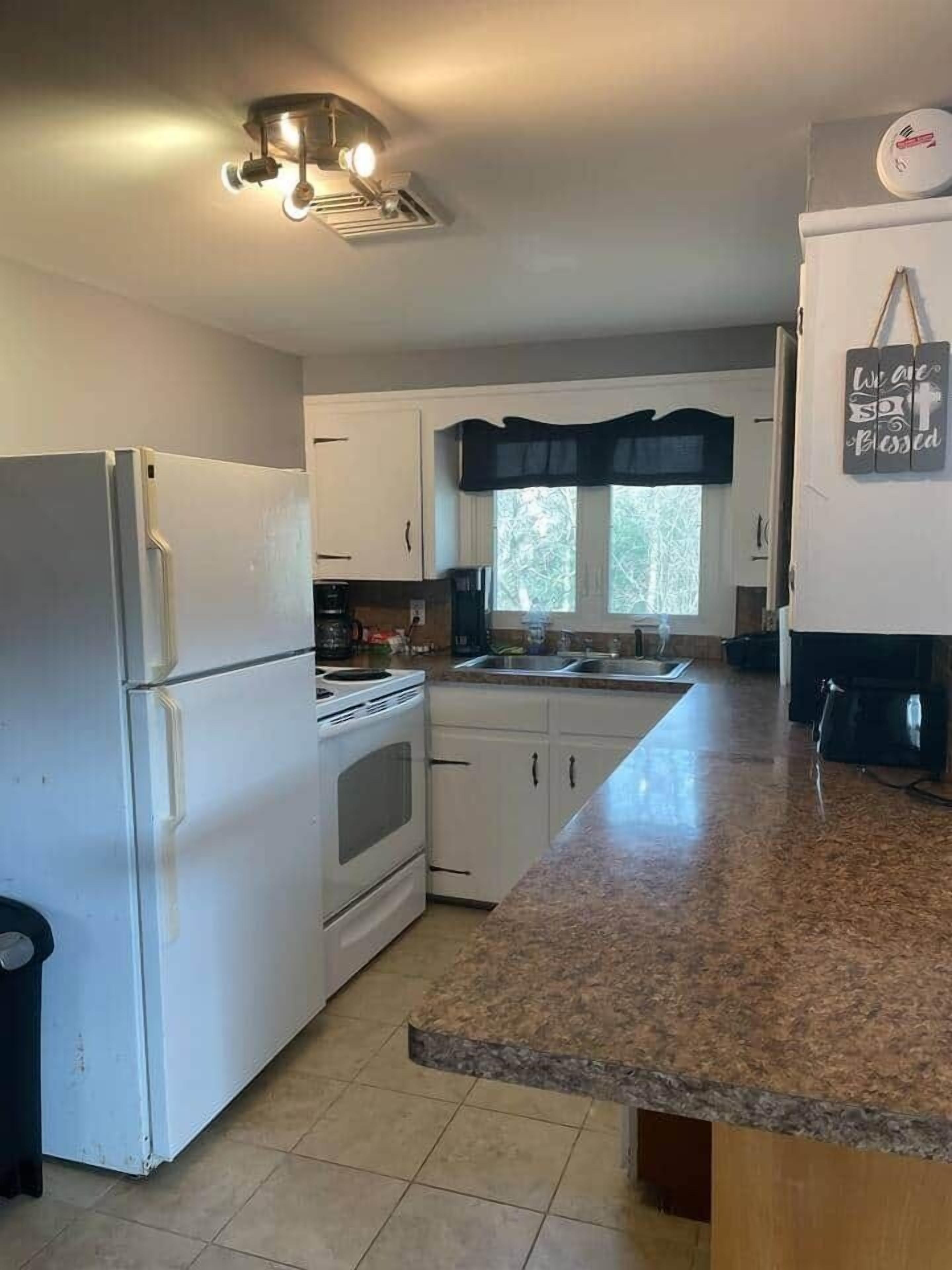 Fridge, oven, stovetop, cookware/dishes/utensils