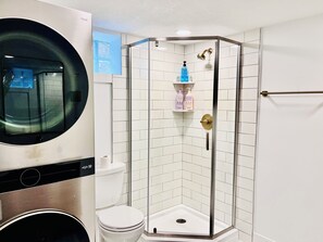 Shower, hair dryer, towels, soap