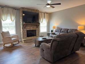 Smart TV, fireplace, books