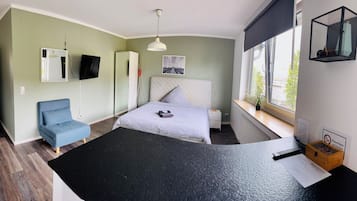1 habitación, tabla de planchar con plancha y wifi
