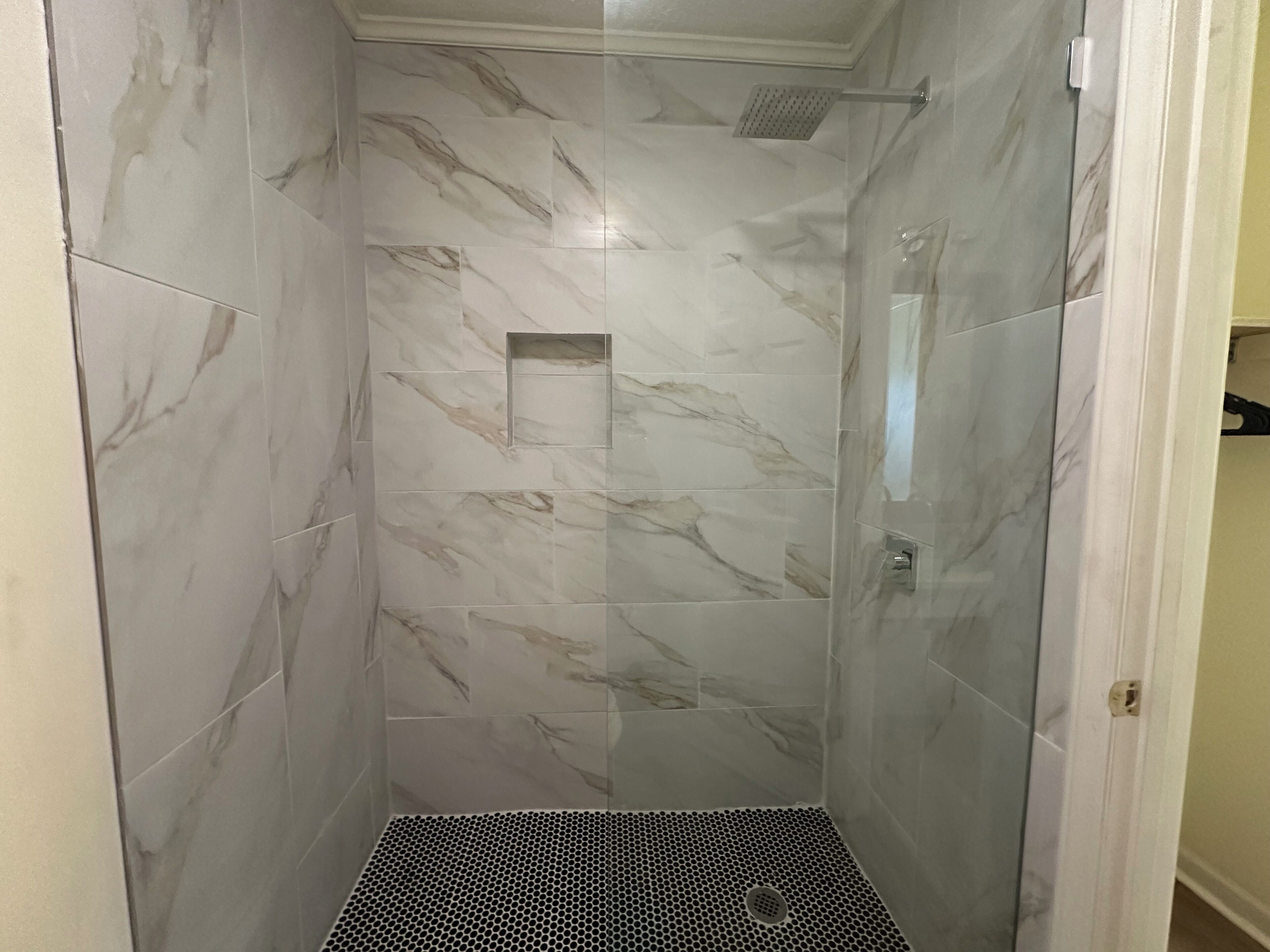 Shower, towels, soap, toilet paper