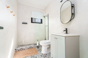 Shower, hair dryer, towels, soap