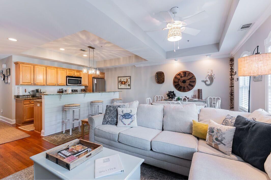 Townhome, Multiple Beds, Balcony, Garden View (Pearl of the Promenade) | Living area | 42-inch flat-screen TV with digital channels