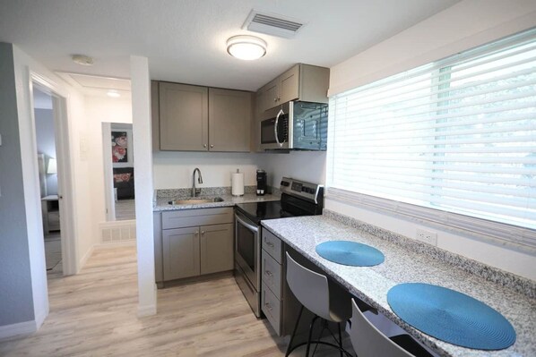 Fridge, microwave, oven, stovetop