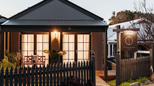 A modern building with a dark roof and large windows. - the tiny burrow ~ magical fleurieu escape (Aldinga)