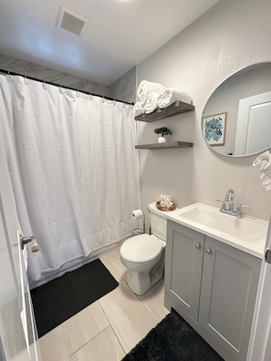 Hair dryer, bidet, towels, toilet paper