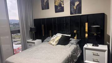 2 dormitorios, tabla de planchar con plancha, wifi y ropa de cama