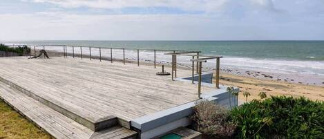 On the beach, sun loungers, beach towels