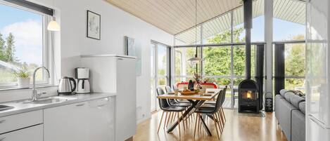 Fridge, stovetop, dishwasher, coffee/tea maker