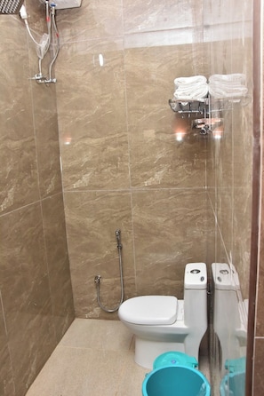 Shower, towels, soap, shampoo
