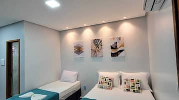 Estúdio família | Cortinas blackout, ferros/tábuas de passar roupa, Wi-Fi de cortesia