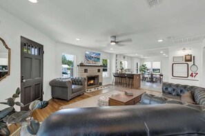 TV, fireplace, books, offices