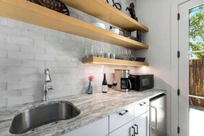 Fridge, microwave, coffee/tea maker, toaster