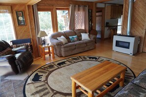 Smart TV - Welcome to Serenity Shores! 🌅 Soak in the private hot tub, unwind by the fire pit 🔥, and savor calming lake views. Pet-friendly 🐾 and perfect for recharging, exploring, and making memories. (South Boardman)