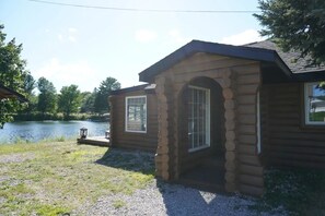 Exterior - Welcome to Serenity Shores! 🌅 Soak in the private hot tub, unwind by the fire pit 🔥, and savor calming lake views. Pet-friendly 🐾 and perfect for recharging, exploring, and making memories. (South Boardman)