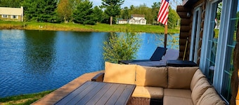 Welcome to Serenity Shores! 🌅 Soak in the private hot tub, unwind by the fire pit 🔥, and savor calming lake views. Pet-friendly 🐾 and perfect for recharging, exploring, and making memories.