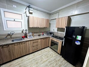 Fridge, microwave, oven, stovetop