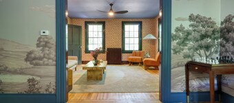 Relax in Style at Historic Modern on Main with Modern Amenities & Wooded Views