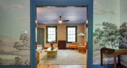 Relax in Style at Historic Modern on Main with Modern Amenities & Wooded Views